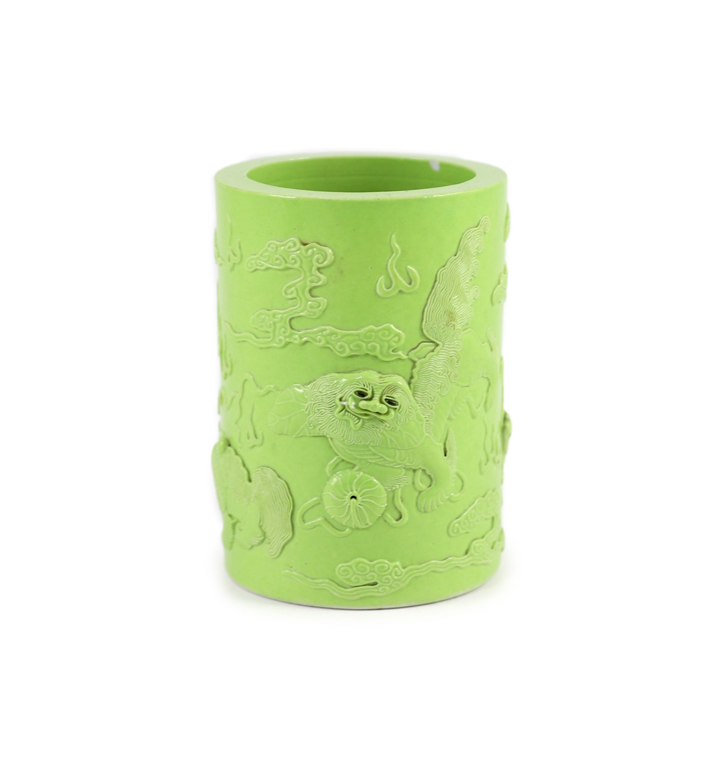 A Chinese lime green glazed brushpot, 19th century, 13.6 cm high, small splinter chip to inner rim